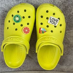 CROCS unisex Lime Green Clogs with Charms size 9